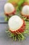 Close up fresh rambutan peeled on wood table with blur rambutan peeled background. Tropical fruit fresh rambutan peeled