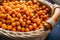 Close-up of fresh raw Buckthorn berries in a wooden basket