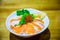 close up fresh salmon filler and egg topped on japanese rice in white bowl. japanese culture food. Salmon Donburi. image for backg