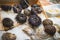 Close up. Fresh sea urchins at a Spanish bazaar. Sea urchins on ice on the counter