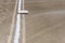 Close up of freshly chalked baseline, with base plate, dirt only, empty baseball field on a sunny day