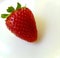 Close up of a freshly picked juicy strawberry