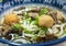 Close-up of a freshly prepared bowl of Japanese Udon noodle soup