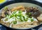 Close-up of a freshly prepared bowl of Japanese Udon noodle soup