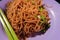 Close up of fried bee hoon with spring onions