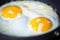 Close-up fried egg in a frying pan