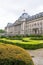 Close up of front of royal palace in brussels belgium with garden hedges