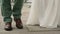 Close-up of front view business man elegant shoes walking. Legs close up shot of Businessman and his businesswoman