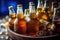 close-up of frosty beer bottles chilling in ice bucket