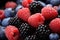 Close up of frozen berries on white background, blueberries, raspberries, and strawberries