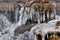 Close-up of a frozen waterwall on a sunny winter day