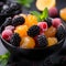 Close-up of fruit salad with raspberries, blackberries and pineapple pieces
