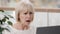 Close-up frustrated mature businesswoman looking at laptop screen reading email stunned shocked by unpleasant bad news