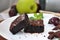 Close up Fudge Brownie with Fresh Fruits on Background