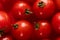 Close-up full frame shot of fresh red tomatoes heap