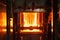 close-up of a furnace, with flames burning bright and hot