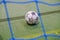 Close-up of futsal mini football goalpost, artificial grass