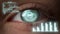 Close up futuristic ceo eye analysing process checking financial benefits