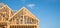 Close-up gable roof wooden house construction