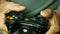 Close-up of a game joystick from a video game console in the hands of a pensioner. Active recreation of the elderly in the games a