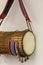 Close up of Gangan or Talking drum with Saworo Ide, a Nigeria Yoruba musical instrument.