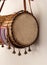 Close up of Gangan or Talking drum with Saworo Ide, a Nigeria Yoruba musical instrument.Yoruba arts and crafts 