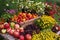 close-up of a garden's bounty, with ripe fruits and vegetables, colorful blossoms and herbs