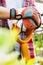 Close up of gardener wearing gloves while holding shovel in garden shop