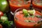 close-up of gazpacho, with ingredients visible and bright