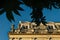 Close up of Gemini houses - casas gemelas - framed by leaves at the colonial city of Merida, Yucatan, Mexico