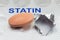 Close up of a generic statin tablet