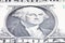 Close up of george washington on a dollar bill.