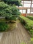 Close up of the Ginshadan sand layout, tree and plants at Japanese zen garden in Kyoto.