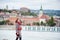 Close-up girl against blurred view of Buda side at Budapest