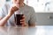 Close Up Of Girl Drinking Sugary Fizzy Soda From Glass With Straw