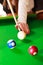 Close up on girl hand playing billiard.