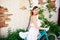 Close-up of girl in romantic image holding vintage bicycle