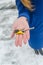 Close-up of girl`s hand with the realtor the keys in the hands