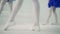 Close up of girl`s small feet in process of ballet training