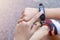 Close up Girl using smartwatch touching button and touchscreen on active sports. Finger touch button on smarth watch. Girl set