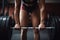 A close-up of a girls hands gripping the barbell