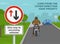 Close-up of give way to oncoming vehicles sign. Back view of a stopped motorcycle rider.