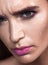 Close up glamour beauty woman portrait. Fashion wet shiny skin, with drops gloss lips make-up and pink eyebrows