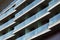 Close-up of glass balconies of modern hotel building