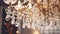 Close-up of glass chandelier with gold trim