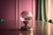 Close-up of a glass sphere in a pink room, ai generated