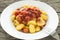 Close up Gnocchi with tomato sauce