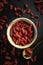 Close-up of goji berries on a black background