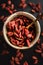 Close-up of goji berries on a black background