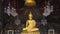 Close up of gold buddha in the ordination hall of wat arun temple, bangkok